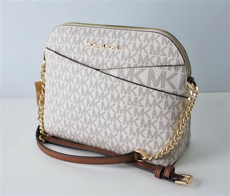 michael kors jet set travel md dome crossbody leather luggage|Jet Set Travel Medium Logo Dome Crossbody Bag .